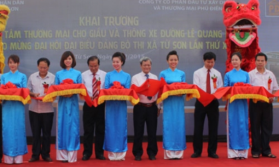 Khai trương Trung tâm thương mại chợ Giàu và thông xe đường Lê Quang Đạo