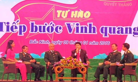 Giao lưu “Tự hào tiếp bước vinh quang”