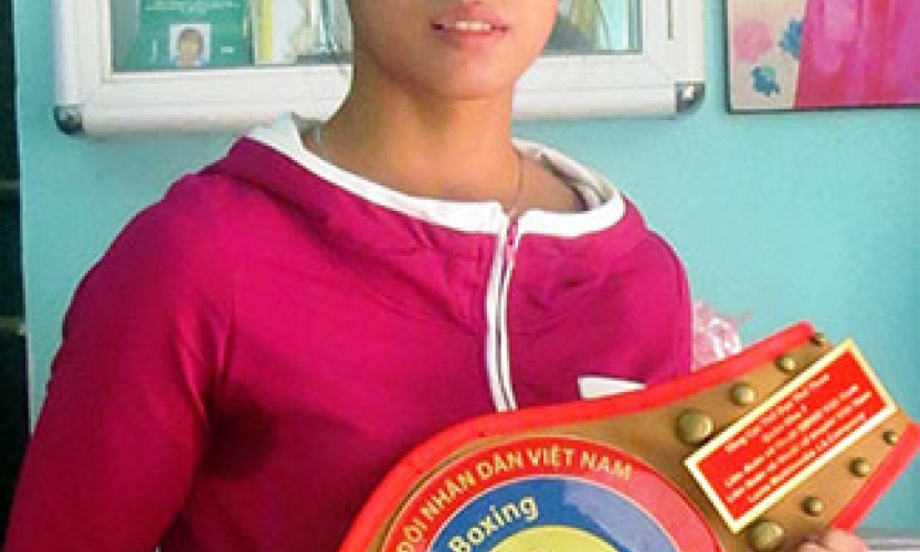 Vương Thị Vỹ đại diện cho Boxing Việt Nam tranh tài ở hạng cân 57 kg tại ASIAD 18
